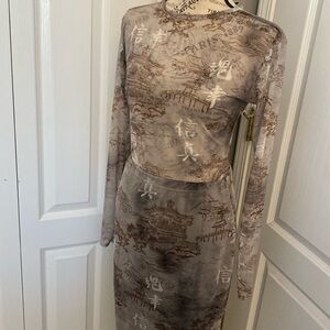 Pretty little thing. Gray oriental printed mesh long sleeved  bodysuit size 12.
